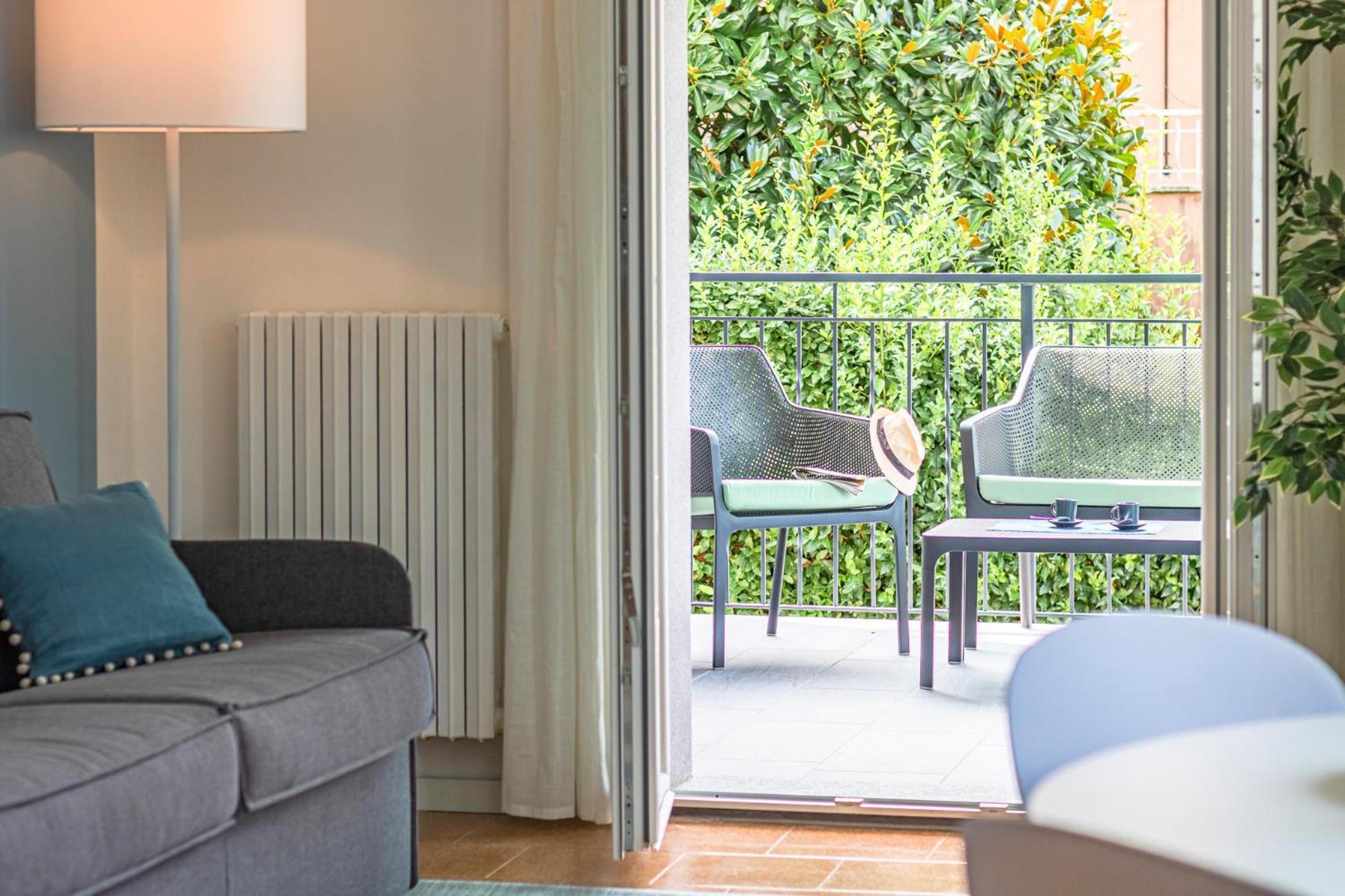 Ninfea Apartments By Wonderful Italy Леццено Екстер'єр фото